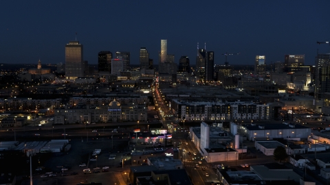 Wide view of traffic on Church Street and city skyline, Downtown Nashville, Tennessee Aerial Stock Photos | DXP002_115_0011