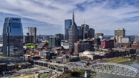 AT&T Building near bridge and Cumberland River in Downtown Nashville, Tennessee Aerial Stock Photos | DXP002_116_0004