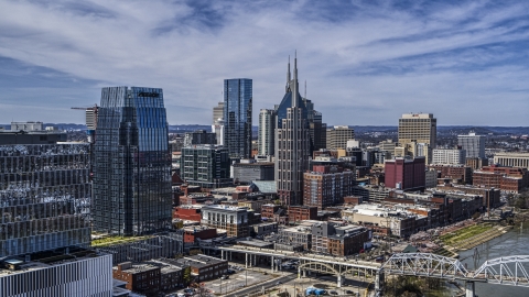 DXP002_116_0006 - Aerial stock photo of Skyscrapers seen from near an office high-rise in Downtown Nashville, Tennessee