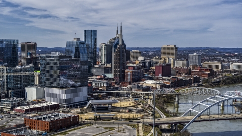 The AT&T Building seen seen from the side of the river in Downtown Nashville, Tennessee Aerial Stock Photos | DXP002_116_0016