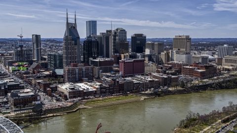 The city's skyline overlooking the Cumberland River, Downtown Nashville, Tennessee Aerial Stock Photos | DXP002_117_0005