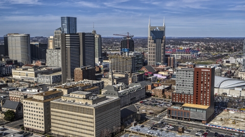 A high-rise hotel and skyscrapers in Downtown Nashville, Tennessee Aerial Stock Photos | DXP002_118_0001