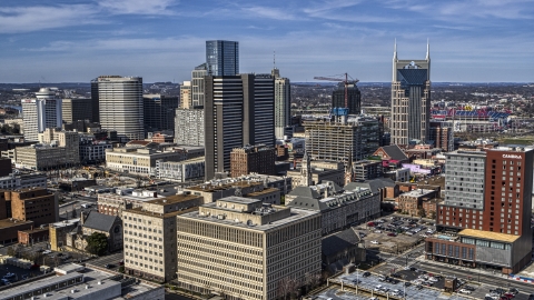 A high-rise hotel and skyscrapers in Downtown Nashville, Tennessee Aerial Stock Photos | DXP002_118_0002