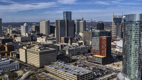 Tall skyscrapers, city buildings in Downtown Nashville, Tennessee Aerial Stock Photos | DXP002_118_0003