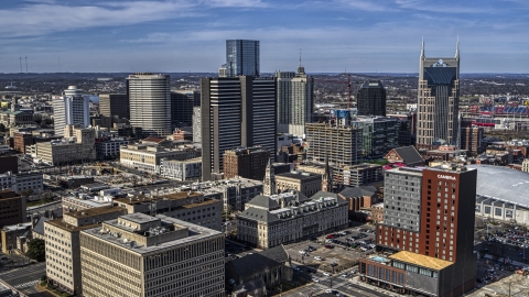 A high-rise hotel by skyscrapers in Downtown Nashville, Tennessee Aerial Stock Photos | DXP002_118_0005