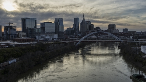 The city's skyline, bridges over the Cumberland River at sunset, Downtown Nashville, Tennessee Aerial Stock Photos | DXP002_119_0011