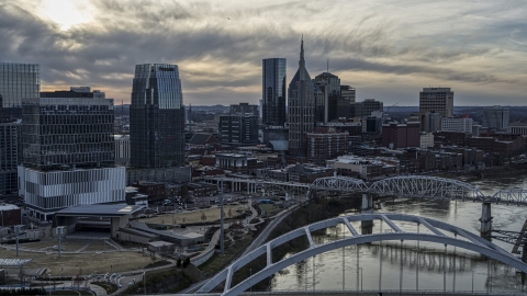 The AT&T Building and city skyscrapers at sunset, Downtown Nashville, Tennessee Aerial Stock Photos | DXP002_119_0013