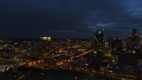 DXP002_121_0008 - Aerial stock photo of The Pinnacle skyscraper and AT&T Building flanking Broadway at twilight, Downtown Nashville, Tennessee