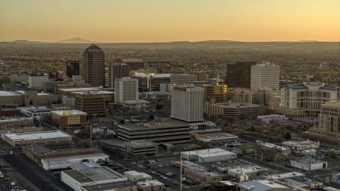 A view of high-rise office buildings at sunset, Downtown Albuquerque, New Mexico Aerial Stock Photos | DXP002_122_0008