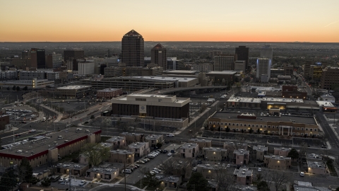 Office tower and hotel tower at sunset near office high-rises, Downtown Albuquerque, New Mexico Aerial Stock Photos | DXP002_123_0002