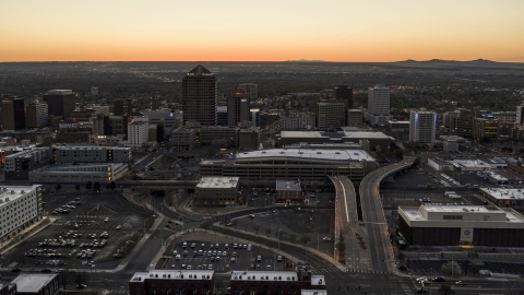 Albuquerque Plaza, Hyatt Regency, office high-rises at sunset in Downtown Albuquerque, New Mexico Aerial Stock Photos | DXP002_123_0004