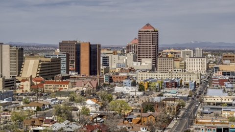 A view of Albuquerque Plaza office high-rise and surrounding buildings, Downtown Albuquerque, New Mexico Aerial Stock Photos | DXP002_124_0010