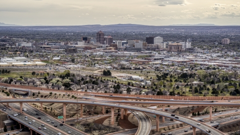 DXP002_126_0004 - Aerial stock photo of Downtown Albuquerque high-rises seen from a freeway interchange, New Mexico