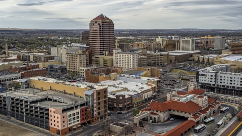 Albuquerque Plaza high-rise and neighboring city buildings, Downtown Albuquerque, New Mexico Aerial Stock Photos | DXP002_127_0002