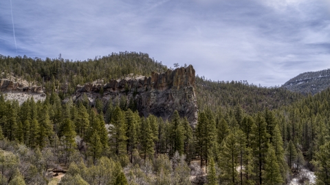 A rock formation in the mountains in New Mexico Aerial Stock Photos | DXP002_129_0006