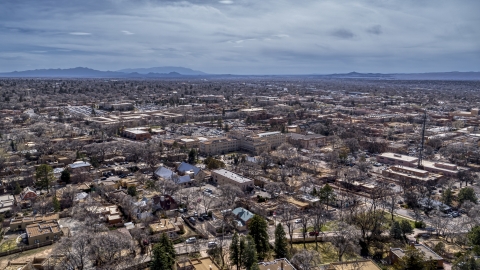 DXP002_129_0010 - Aerial stock photo of The downtown area and surrounding city of Santa Fe, New Mexico