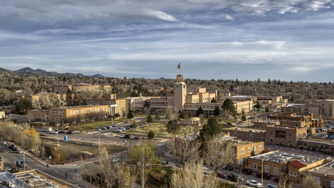 DXP002_131_0014 - Aerial stock photo of The front of the Bataan Memorial Building in Santa Fe, New Mexico