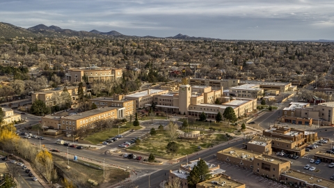 DXP002_131_0015 - Aerial stock photo of The Bataan Memorial Building beside the state capitol building, Santa Fe, New Mexico