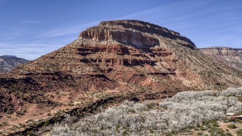 A tall, rocky butte in New Mexico Aerial Stock Photos | DXP002_135_0002