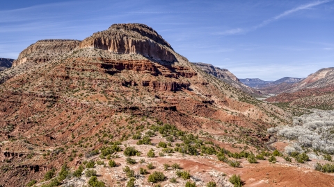 The side of a large butte with steep slopes, New Mexico Aerial Stock Photos | DXP002_135_0004