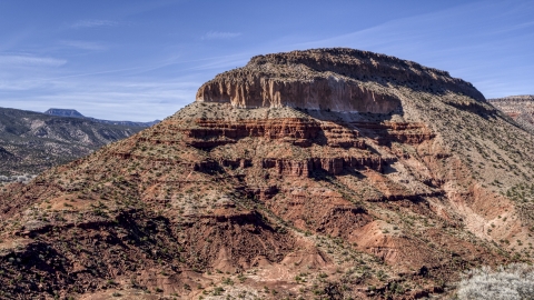 The side of a rugged butte with steep slopes, New Mexico Aerial Stock Photos | DXP002_135_0006