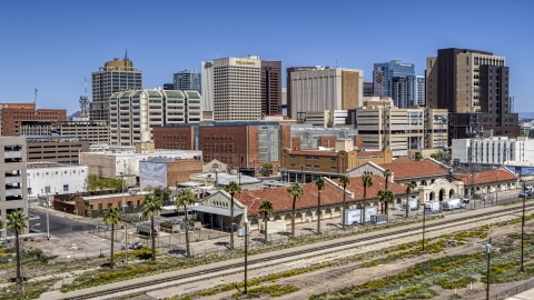 DXP002_136_0004 - Aerial stock photo of The city skyline seen from a train station in Downtown Phoenix, Arizona