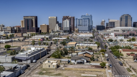 DXP002_136_0005 - Aerial stock photo of Tall office buildings at the end of Central Avenue, Downtown Phoenix, Arizona