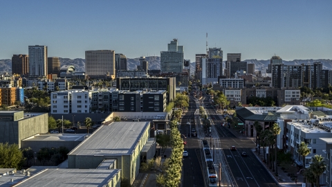 A view of high-rise office buildings in the distance in Downtown Phoenix, Arizona Aerial Stock Photos | DXP002_138_0007