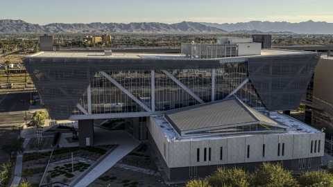 DXP002_142_0009 - Aerial stock photo of The front of the Maricopa County Sheriff’s Office at sunset in Downtown Phoenix, Arizona