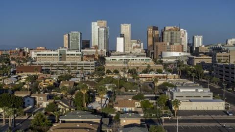 High-rise office buildings of the city's skyline at sunset in Downtown Phoenix, Arizona Aerial Stock Photos | DXP002_143_0001