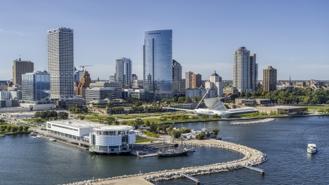 A view of city buildings near the waterfront museum in Downtown Milwaukee, Wisconsin Aerial Stock Photos | DXP002_149_0004