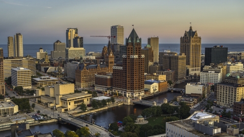 A riverfront office tower at twilight, Downtown Milwaukee, Wisconsin Aerial Stock Photos | DXP002_150_0005