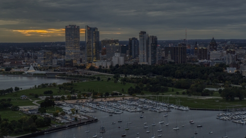 DXP002_155_0004 - Aerial stock photo of The marina and a view of the city's skyline at night, Downtown Milwaukee, Wisconsin