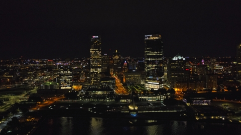 DXP002_157_0002 - Aerial stock photo of A view of tall skyscrapers at night, Downtown Milwaukee, Wisconsin