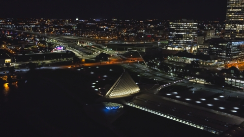 DXP002_157_0006 - Aerial stock photo of The lakefront museum rooftop at night, Downtown Milwaukee, Wisconsin