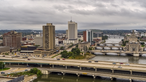 An apartment high-rise and office buildings near bridges and river, Downtown Cedar Rapids, Iowa Aerial Stock Photos | DXP002_164_0002