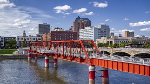 DXP002_165_0010 - Aerial stock photo of Government offices and skyline seen from a pedestrian bridge, Downtown Des Moines, Iowa