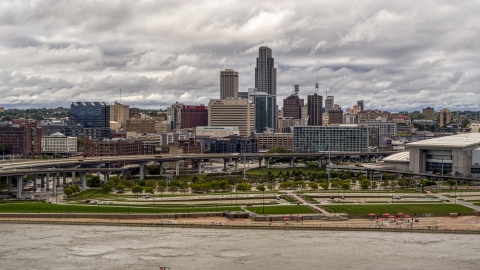 A view across the Missouri River toward the city skyline, Downtown Omaha, Nebraska Aerial Stock Photos | DXP002_168_0002