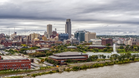 A fountain in a park and city's skyline, Downtown Omaha, Nebraska Aerial Stock Photos | DXP002_169_0008