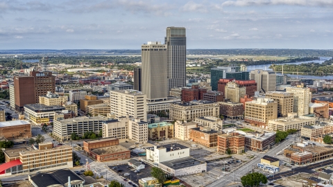 Skyscrapers towering over city buildings in Downtown Omaha, Nebraska Aerial Stock Photos | DXP002_170_0004