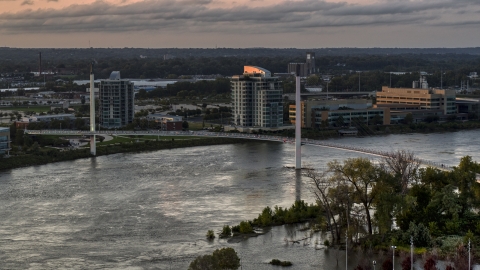 A pedestrian bridge spanning the Missouri River at sunset, Omaha, Nebraska Aerial Stock Photos | DXP002_172_0012