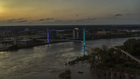 A pedestrian bridge spanning the Missouri River at twilight, Omaha, Nebraska Aerial Stock Photos | DXP002_172_0016