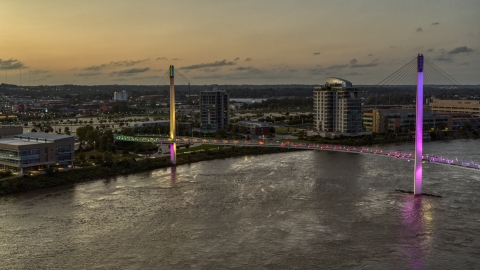 A pedestrian bridge over the Missouri River at twilight, Omaha, Nebraska Aerial Stock Photos | DXP002_172_0018