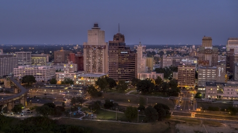 Office high-rises at twilight in Downtown Memphis, Tennessee Aerial Stock Photos | DXP002_182_0001