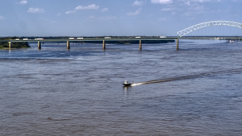 A boat racing across the Mississippi River, Memphis, Tennessee Aerial Stock Photos | DXP002_183_0005