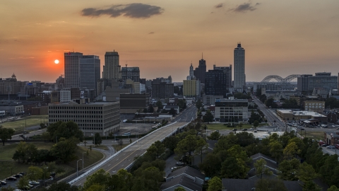 A view of the downtown skyline and the setting sun, Downtown Memphis, Tennessee Aerial Stock Photos | DXP002_186_0004