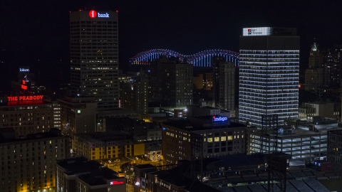 City buildings between office towers at nighttime, Downtown Memphis, Tennessee Aerial Stock Photos | DXP002_188_0003