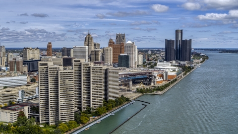 DXP002_189_0001 - Aerial stock photo of The skyline seen from the river, Downtown Detroit, Michigan