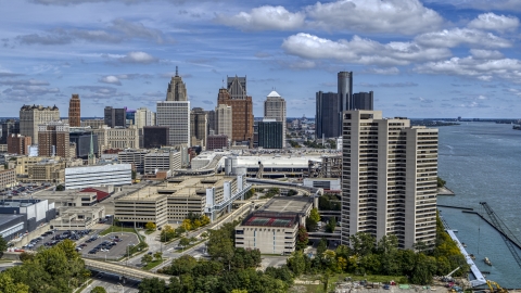 DXP002_189_0002 - Aerial stock photo of The skyline in the distance seen from apartment complex, Downtown Detroit, Michigan