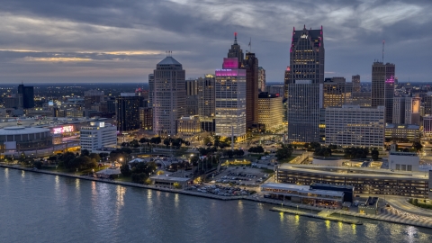 Tall downtown skyscrapers at twilight, Downtown Detroit, Michigan Aerial Stock Photos | DXP002_193_0002